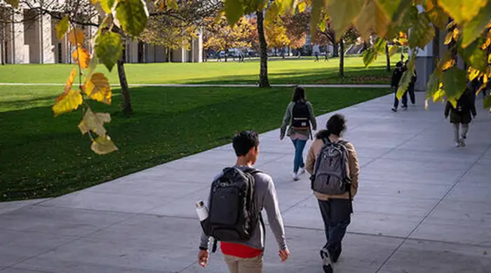 A group of students walking on CMU's campus.
